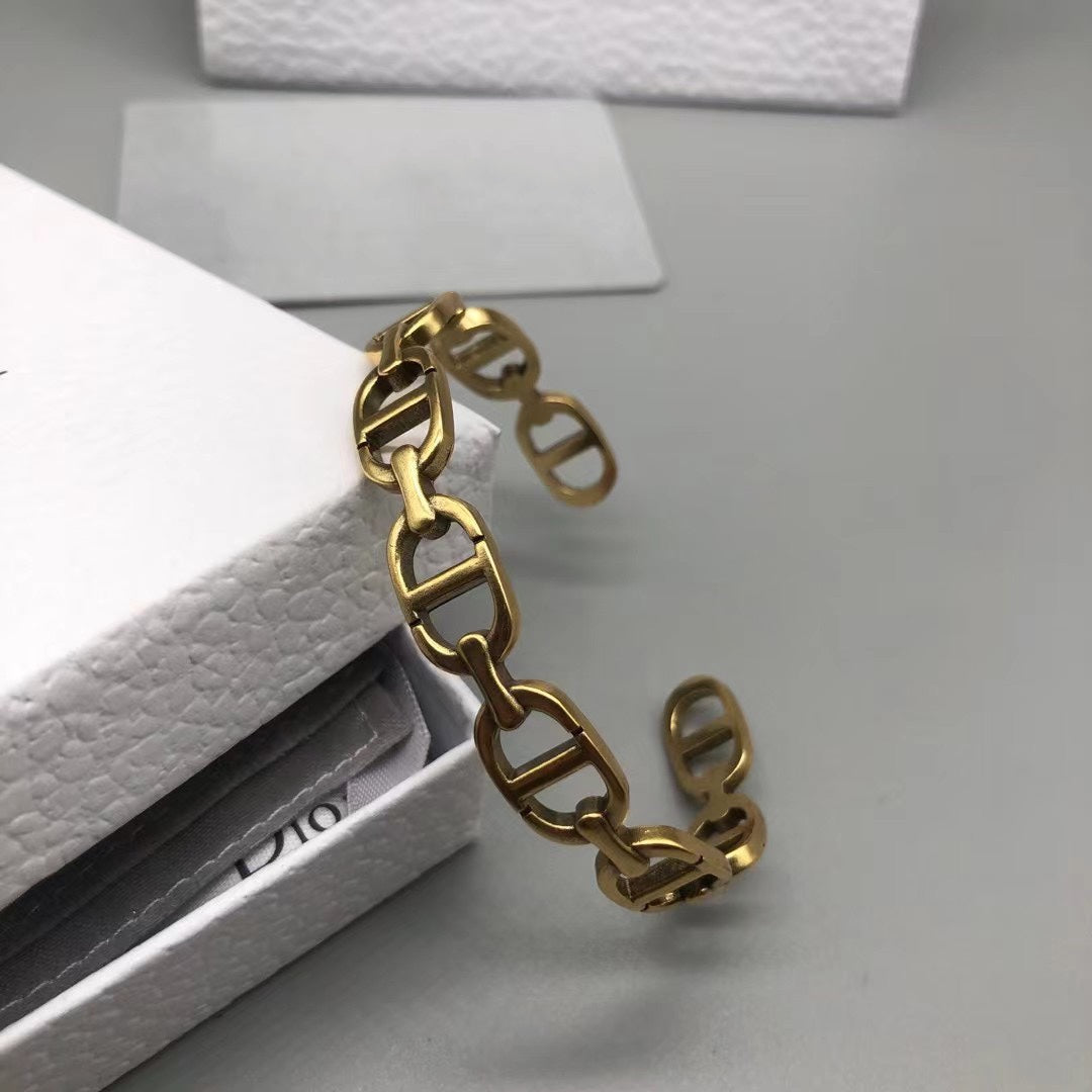 DIOR MOTIF GOLD CUFF BRACELET