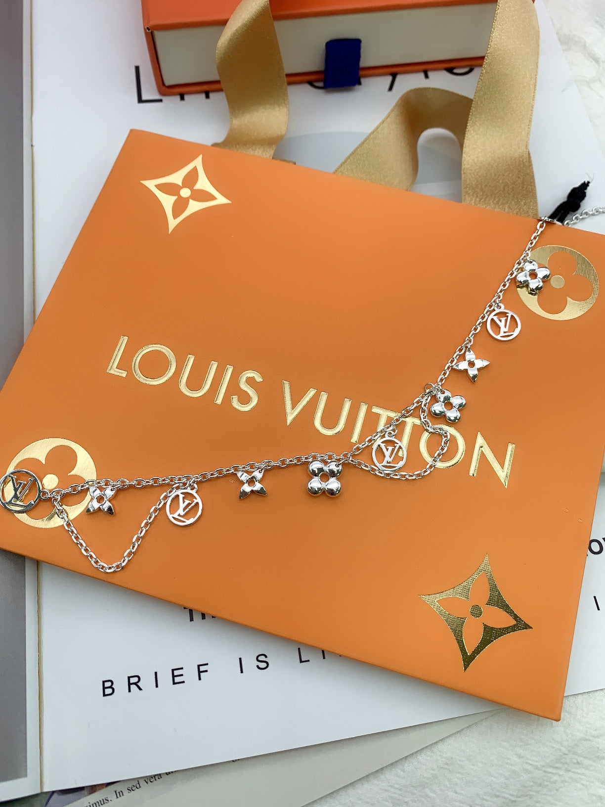 Louis Vuitton STAR AND SUN MULTI CHARM SILVER NECKLACE