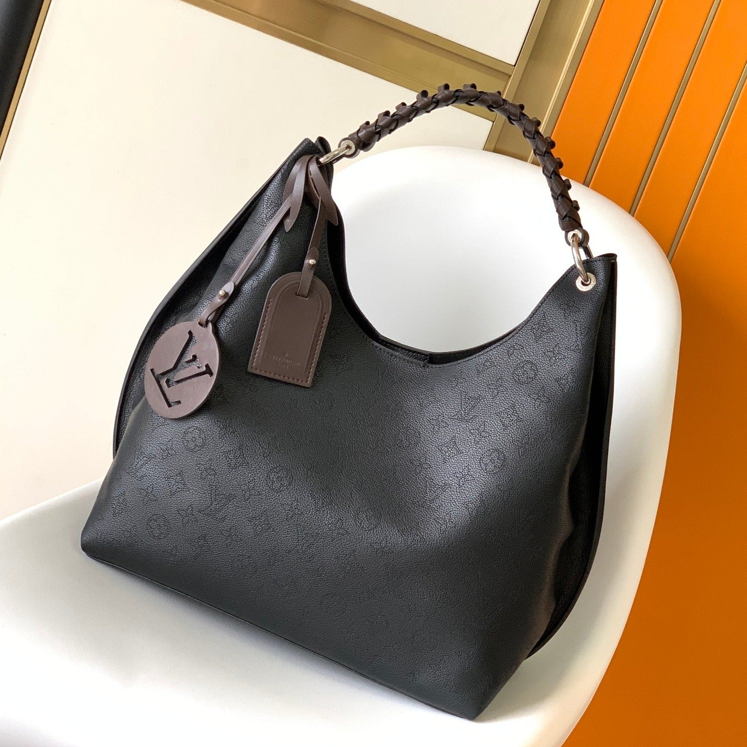Louis Vuitton CARMEL HOBO 40 BLACK MAHINA