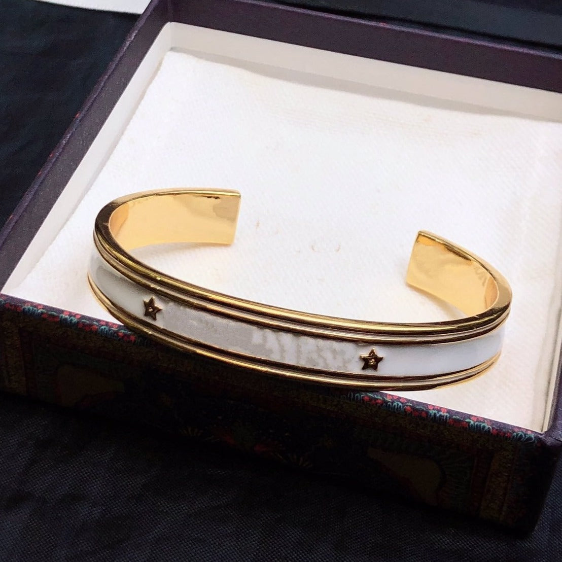 DIOR CODE BANGLE GOLD WHITE METAL AND LACQUER BRACELET