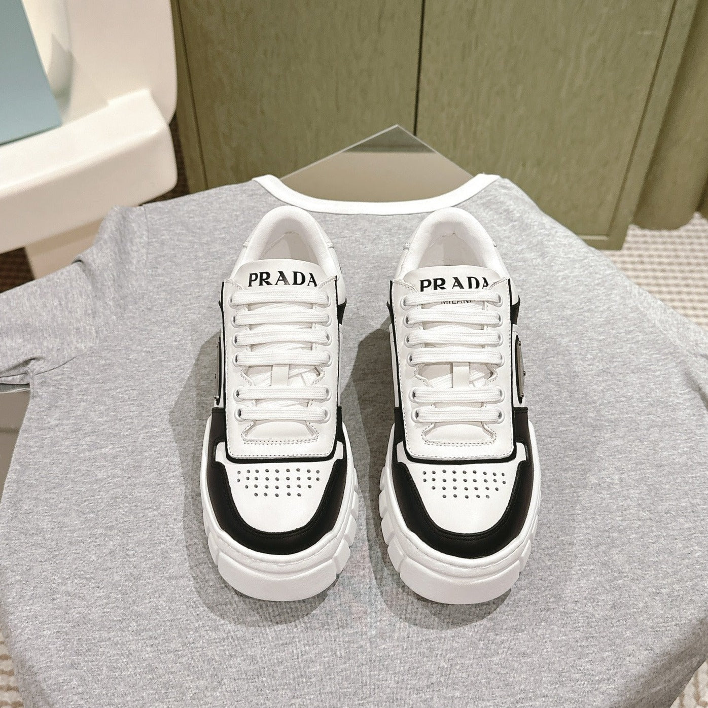 PRADA FLATFORM SNEAKERS BLACK AND WHITE CALFSKIN