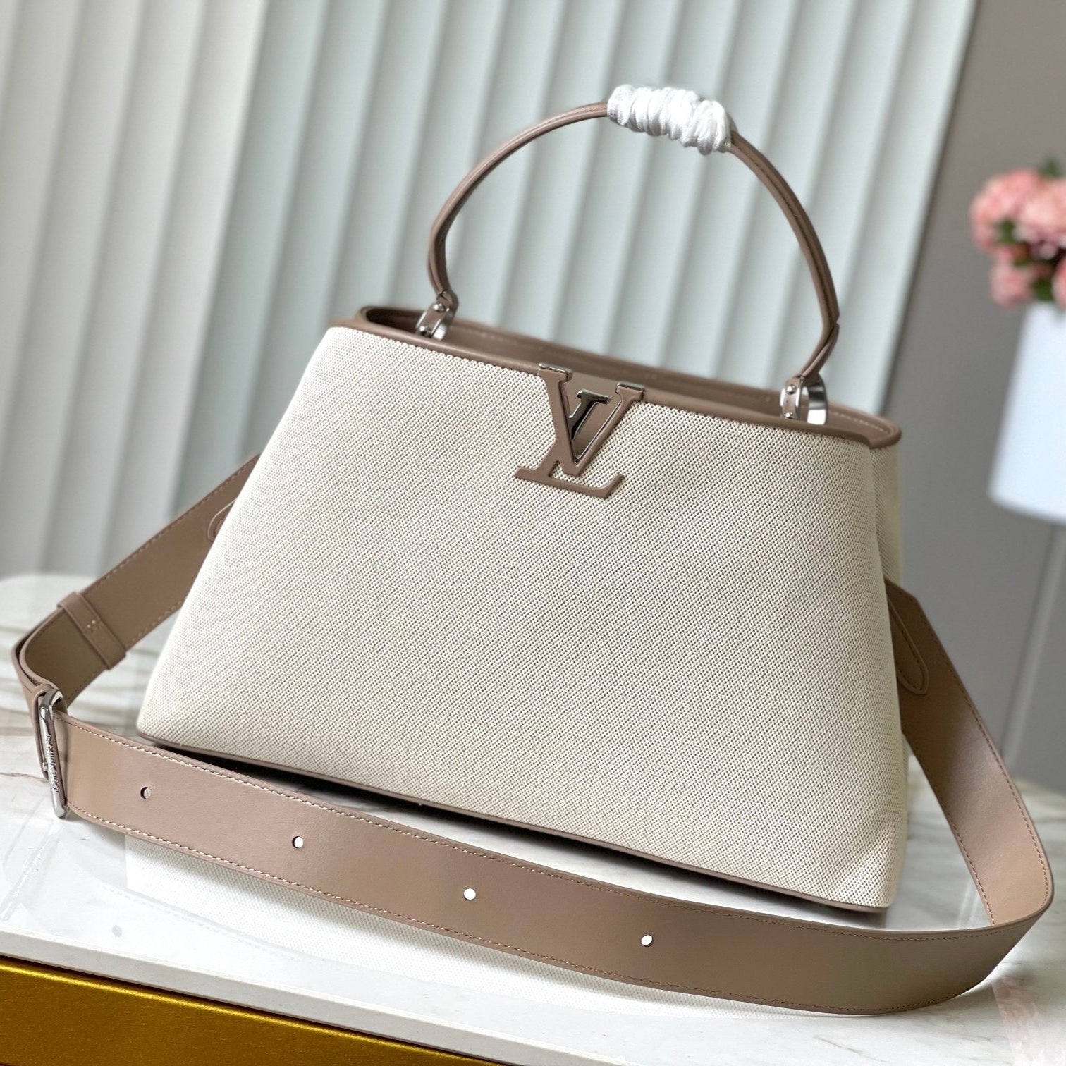 Louis Vuitton CAPUCINES SOUPLE GM 38 IN WHITE CANVAS AND TAUPE CALFSKIN TRIM