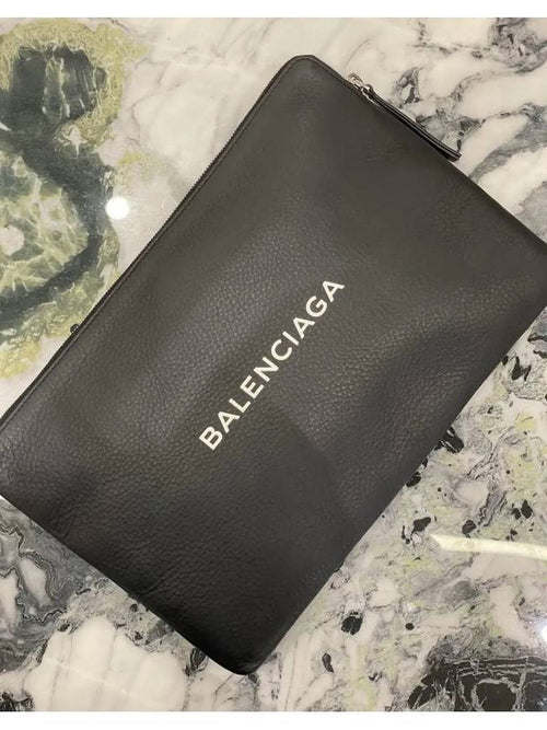 Balenciaga logo clutch bag