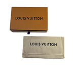 Louis Vuitton Taiga Long Wallet M33402