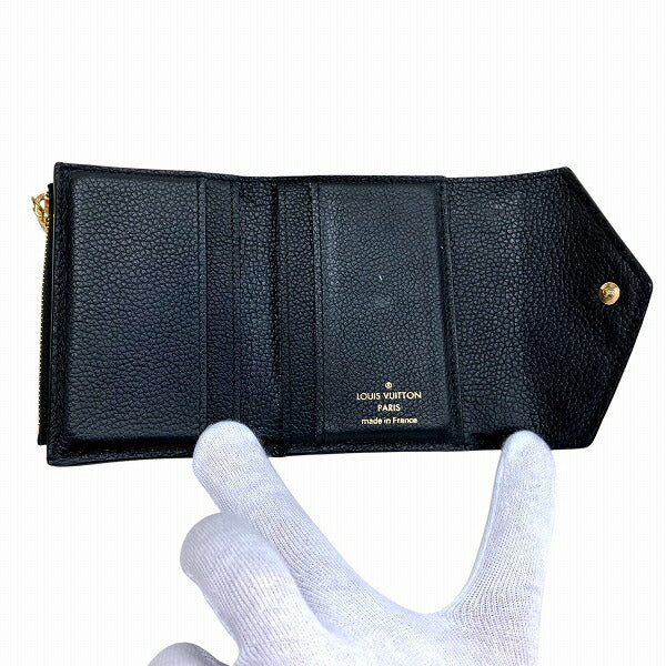 Louis Vuitton Portefeuille Zoe Monogram Tri-fold Wallet
