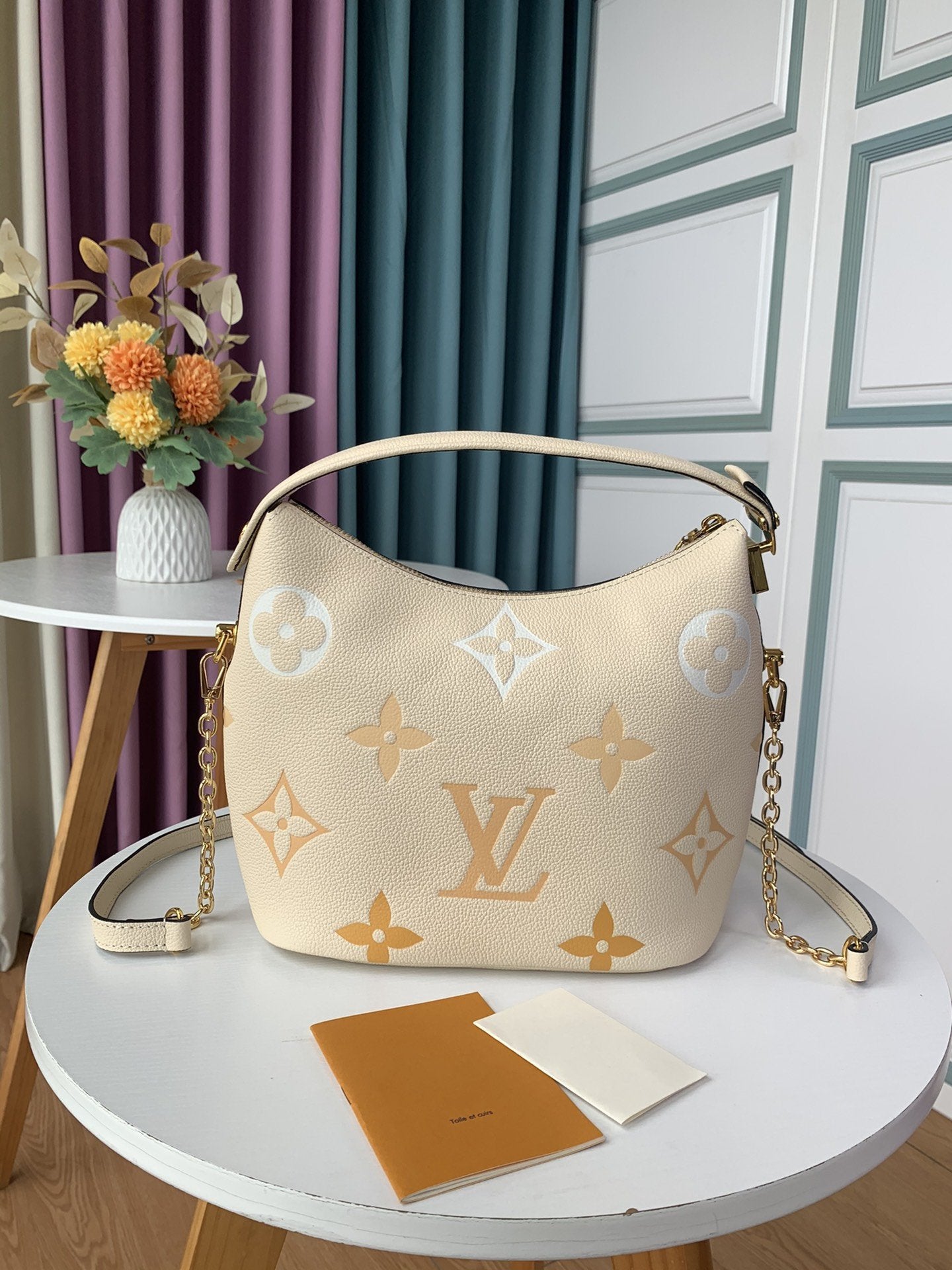 Louis Vuitton MARSHMALLOW HOBO CREAM SAFFRON GRAINED COWHIDE LEATHER