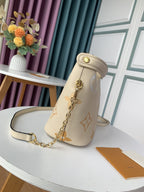 Louis Vuitton MARSHMALLOW HOBO CREAM SAFFRON GRAINED COWHIDE LEATHER