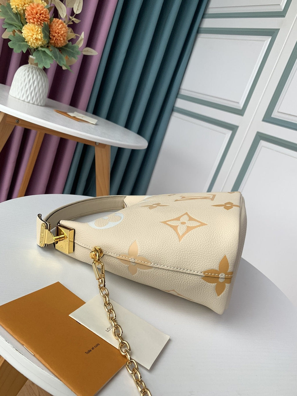 Louis Vuitton MARSHMALLOW HOBO CREAM SAFFRON GRAINED COWHIDE LEATHER