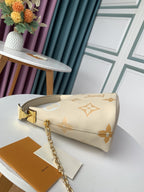 Louis Vuitton MARSHMALLOW HOBO CREAM SAFFRON GRAINED COWHIDE LEATHER