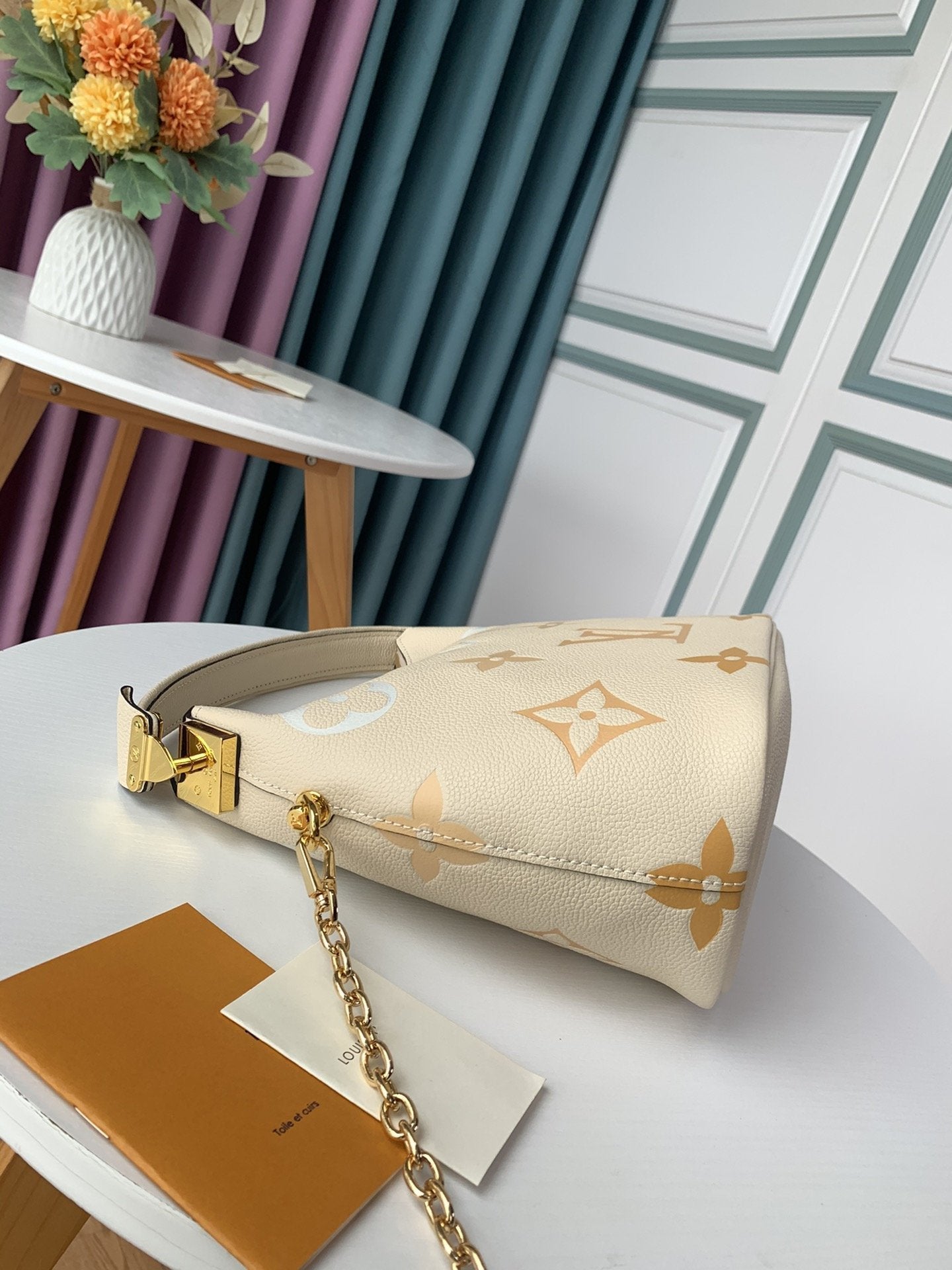 Louis Vuitton MARSHMALLOW HOBO CREAM SAFFRON GRAINED COWHIDE LEATHER