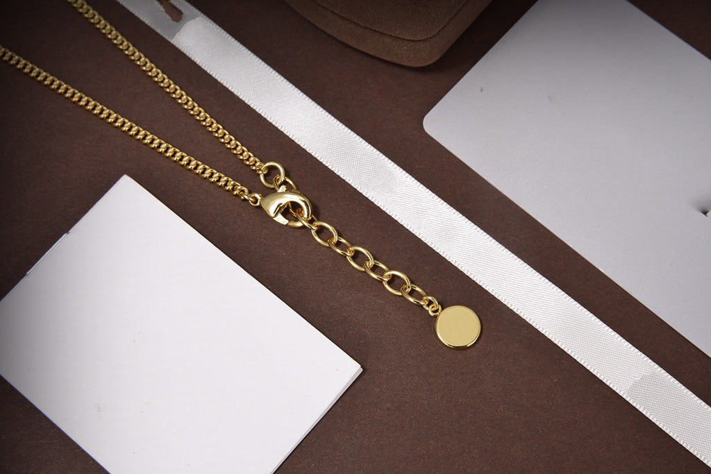 DIOR STAR AND BALL GOLD DIAMOND NECKLACE