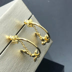 Louis Vuitton STAR AND SUN GOLD HOOP EARRINGS