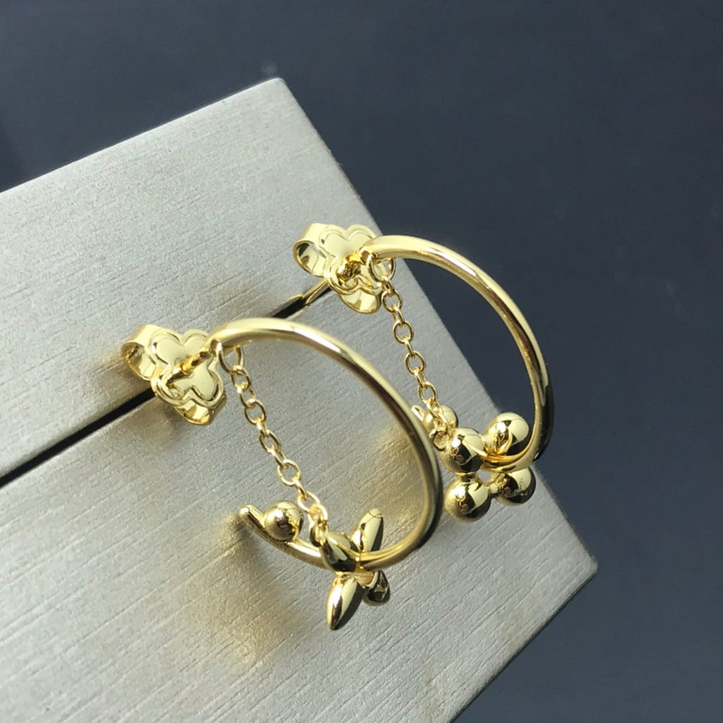Louis Vuitton STAR AND SUN GOLD HOOP EARRINGS