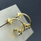 Louis Vuitton STAR AND SUN GOLD HOOP EARRINGS