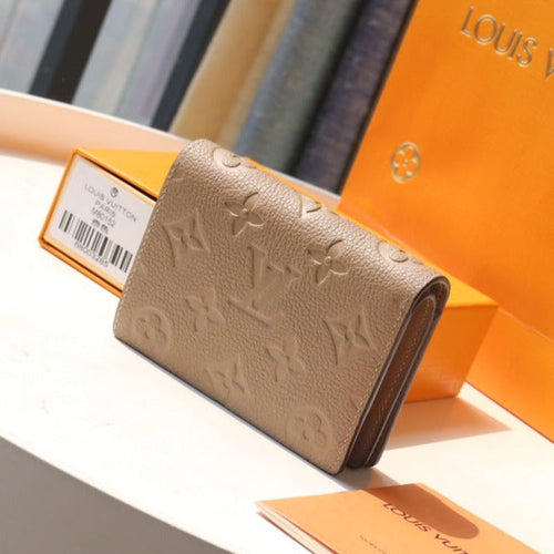 Louis Vuitton CLEA WALLET 12CM BEIGE MONOGRAM EMPREINTE LEATHER