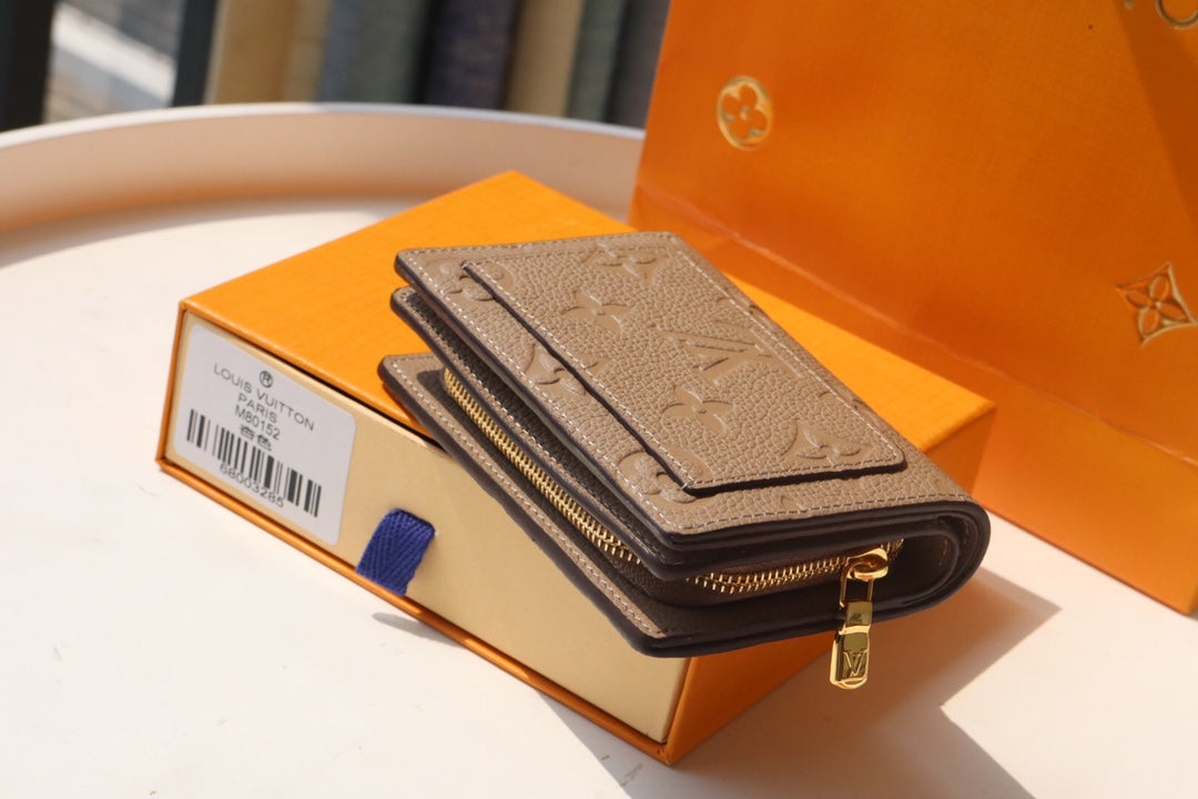 Louis Vuitton CLEA WALLET 12CM BEIGE MONOGRAM EMPREINTE LEATHER