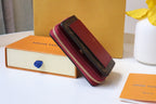 Louis Vuitton LOU WALLET 11.5CM BROWN RED MONOGRAM CANVAS