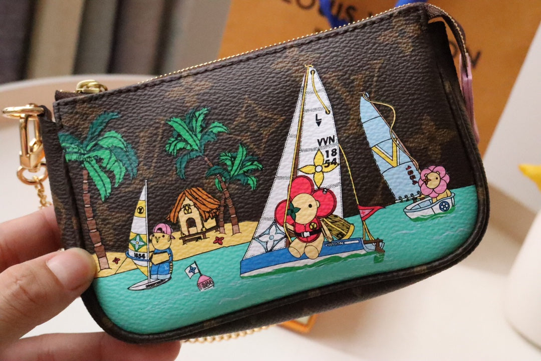 Louis Vuitton MINI POCHETTE ACCESSOIRES 15.5 MONOGRAM CANVAS