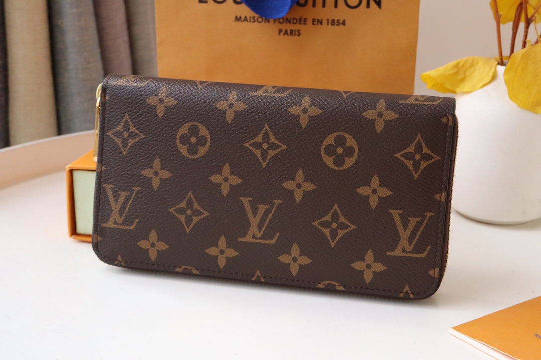Louis Vuitton VIVIENNE ZIPPY WALLET 9.5 MONOGRAM CANVAS