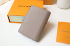Louis Vuitton VERTICAL COMPACT WALLET GREY CAPUCINES