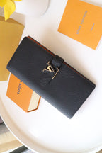 Louis Vuitton VERTICAL WALLET CAPUCINES BLACK