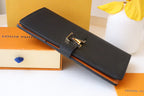 Louis Vuitton VERTICAL WALLET CAPUCINES BLACK