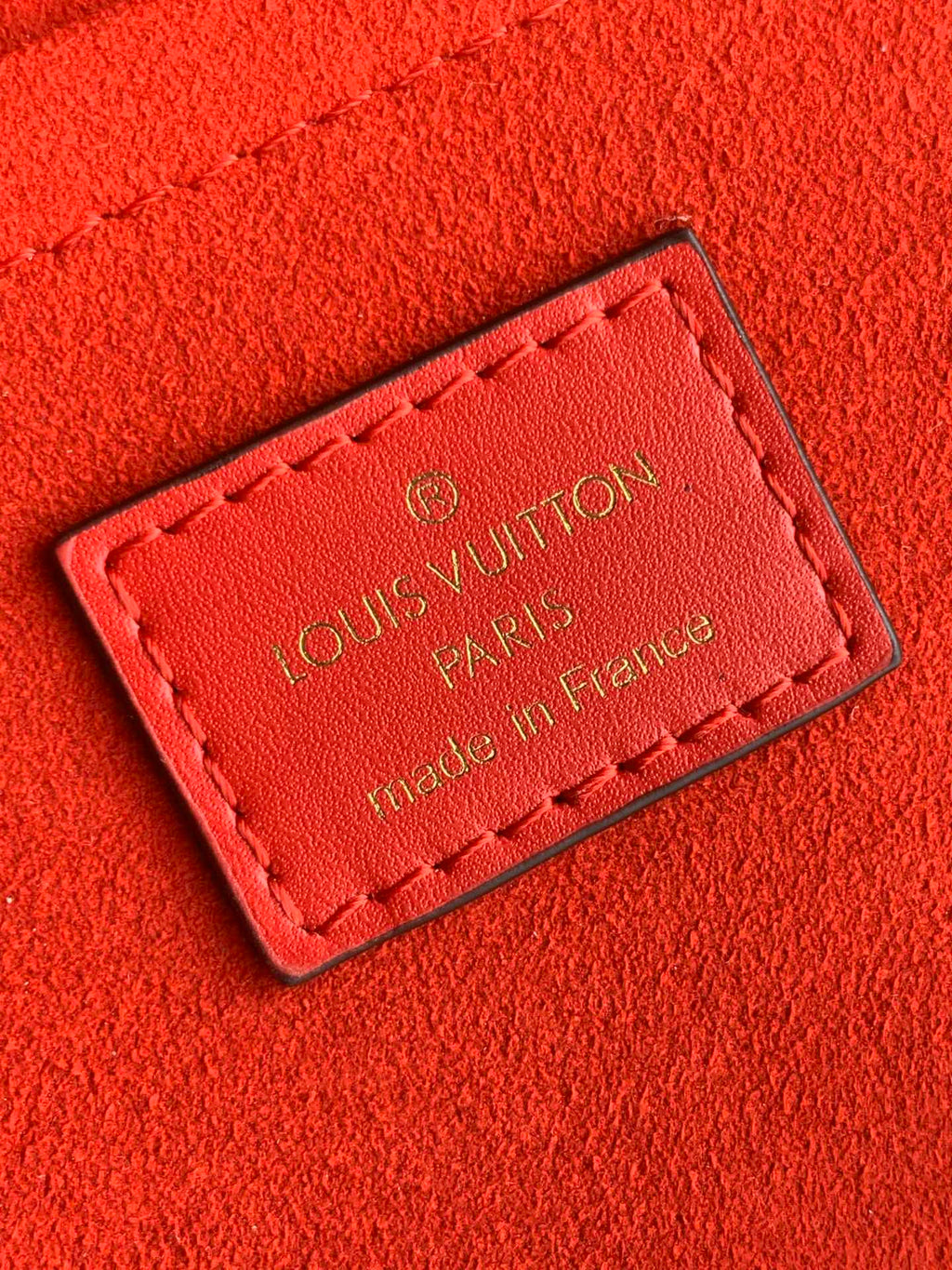 Louis Vuitton LOCKY BB 21 IN BROWN MONOGRAM CANVAS AND RED CALFSKIN GOLD BUCKLE