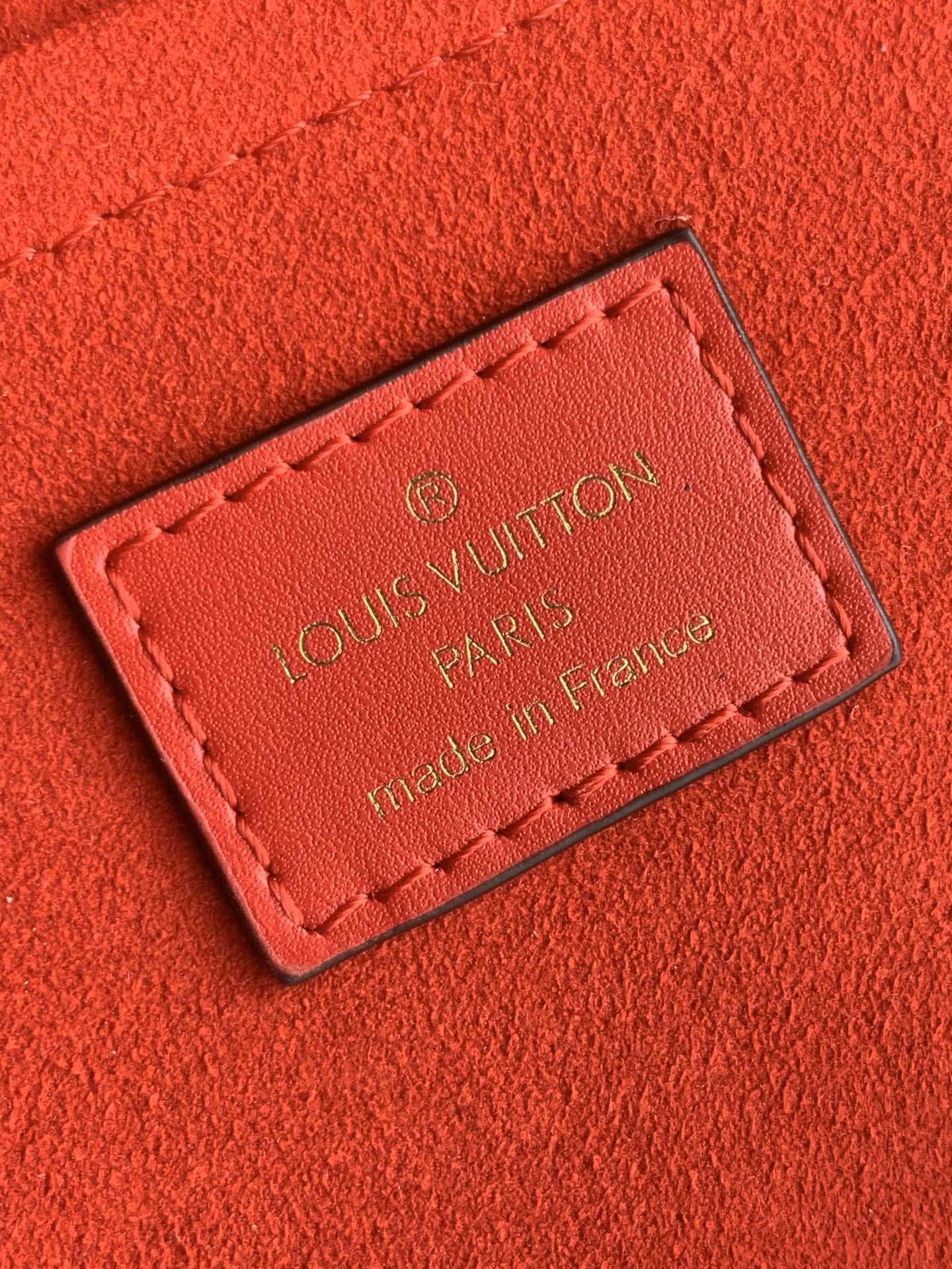 Louis Vuitton LOCKY BB 21 IN BROWN MONOGRAM CANVAS AND RED CALFSKIN GOLD BUCKLE