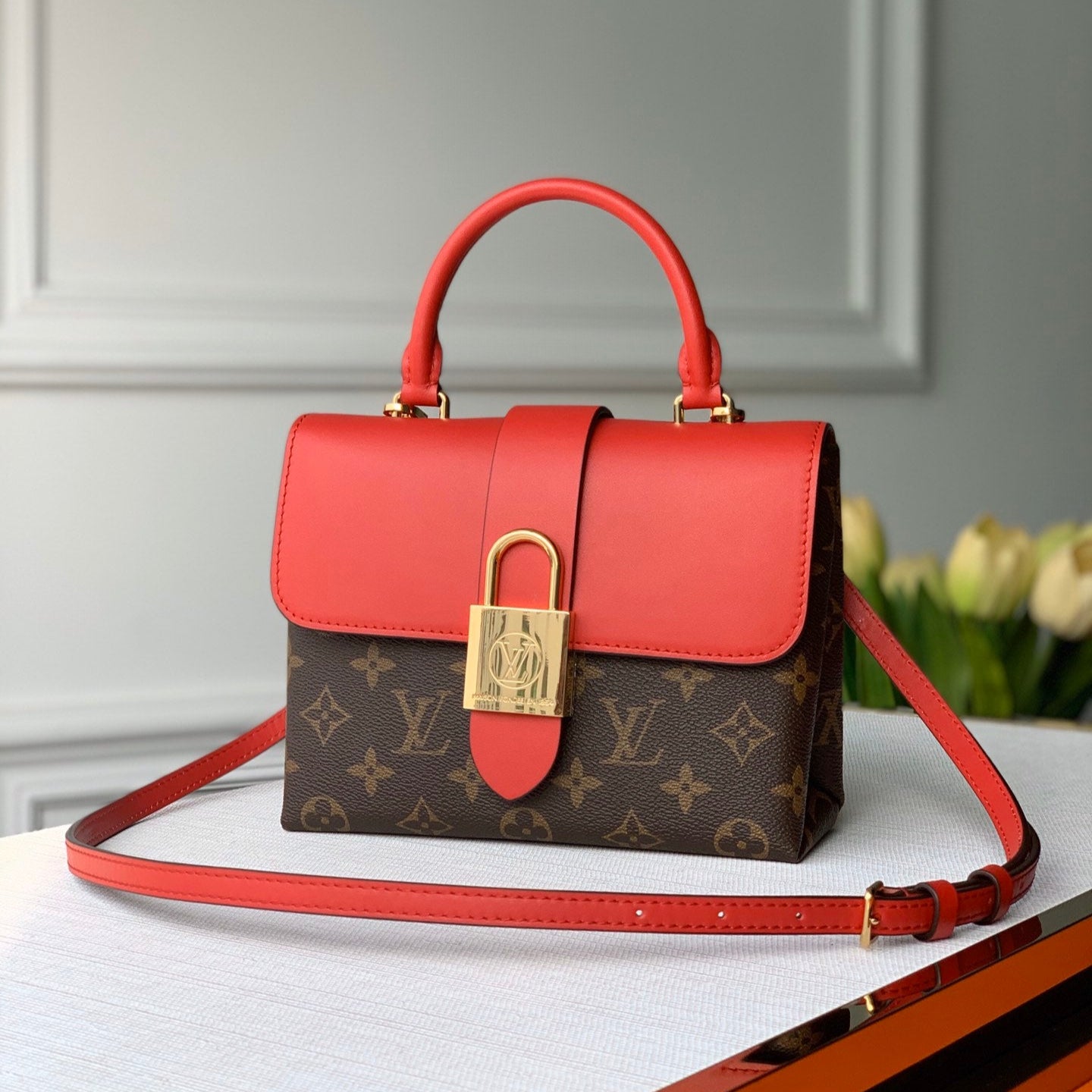 Louis Vuitton LOCKY BB 21 IN BROWN MONOGRAM CANVAS AND RED CALFSKIN GOLD BUCKLE