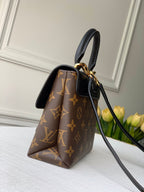 Louis Vuitton LOCKY BB 21 IN BROWN MONOGRAM CANVAS AND BLACK CALFSKIN GOLD BUCKLE