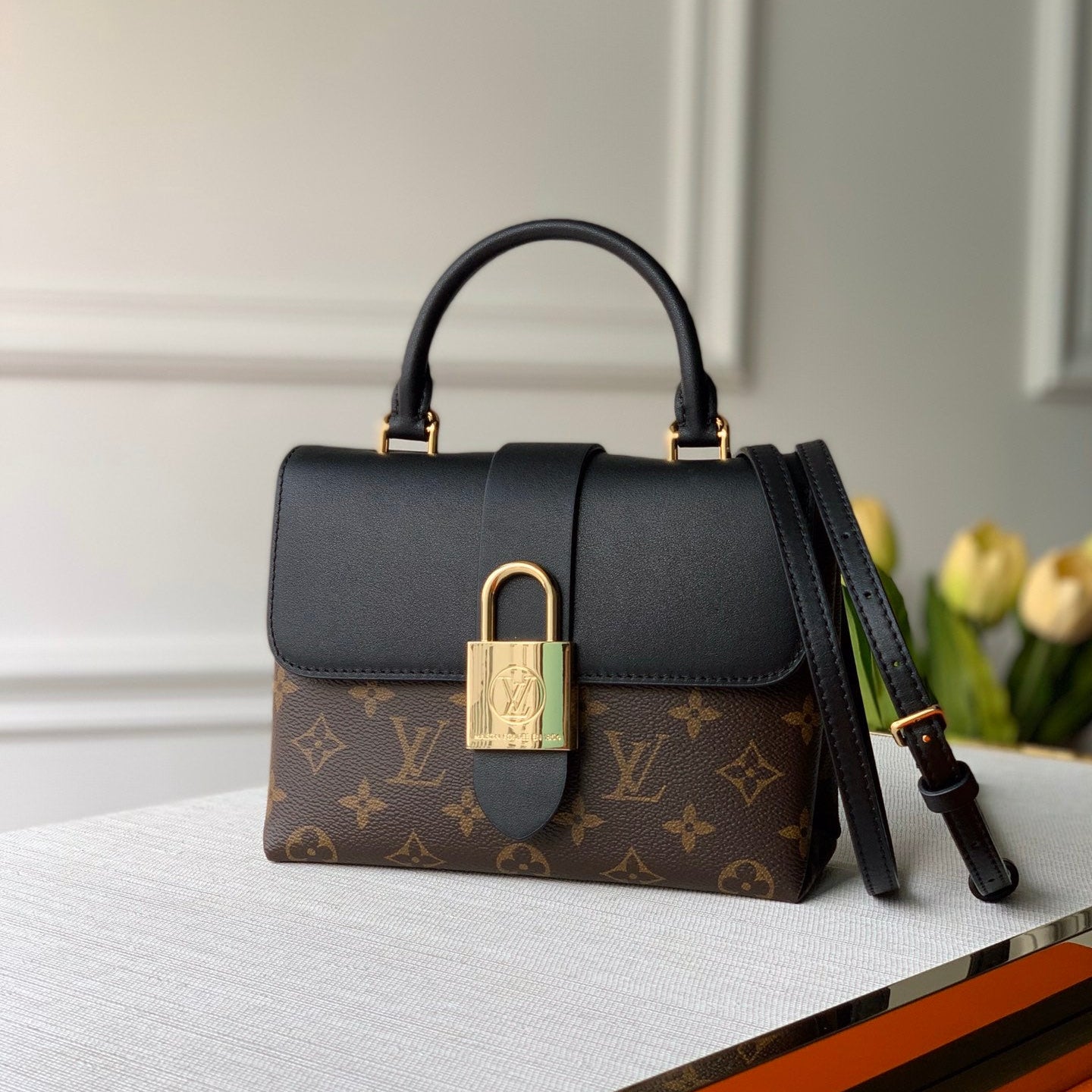 Louis Vuitton LOCKY BB 21 IN BROWN MONOGRAM CANVAS AND BLACK CALFSKIN GOLD BUCKLE