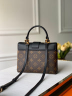 Louis Vuitton LOCKY BB 21 IN BROWN MONOGRAM CANVAS AND BLACK CALFSKIN GOLD BUCKLE