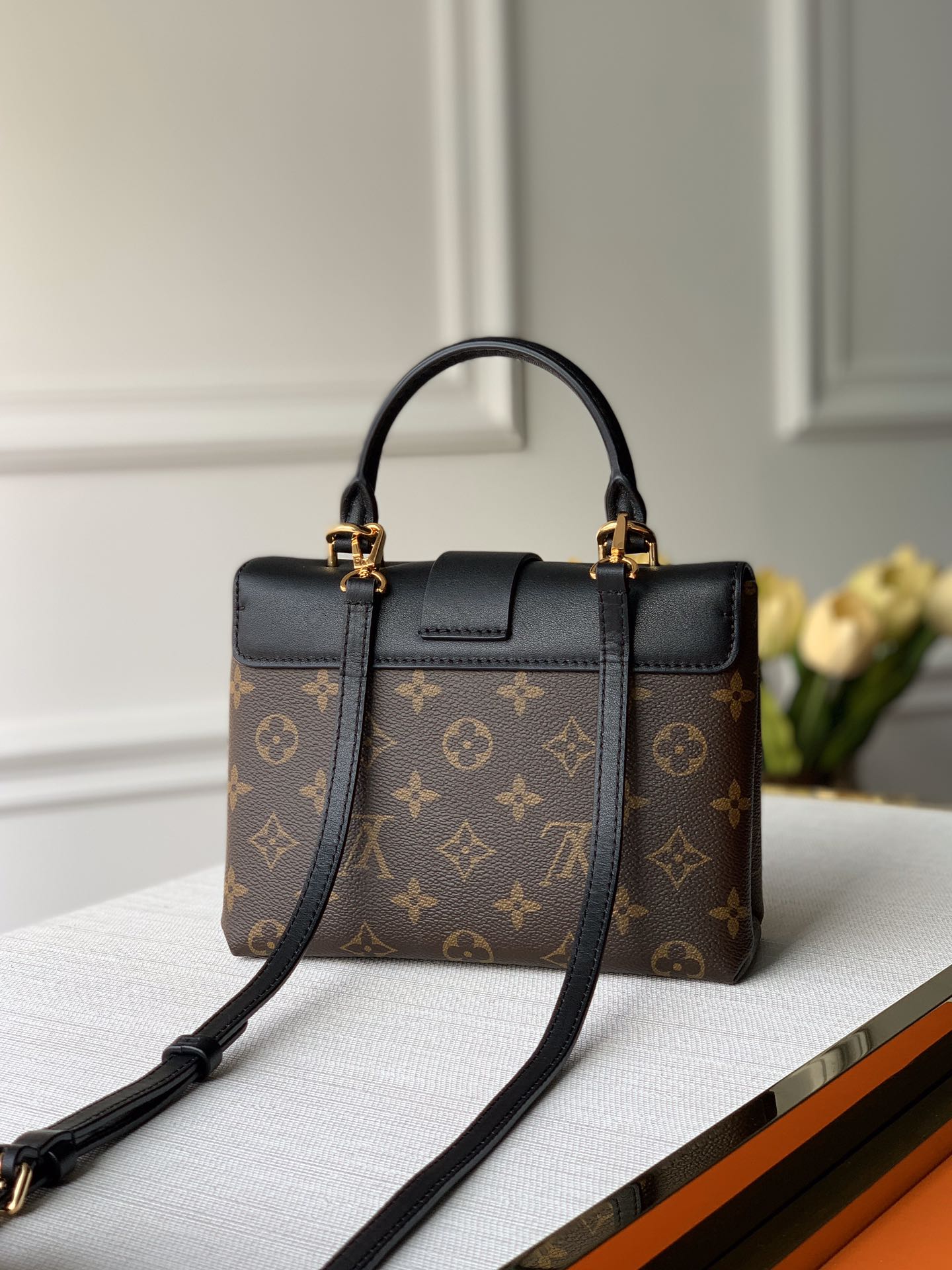 Louis Vuitton LOCKY BB 21 IN BROWN MONOGRAM CANVAS AND BLACK CALFSKIN GOLD BUCKLE