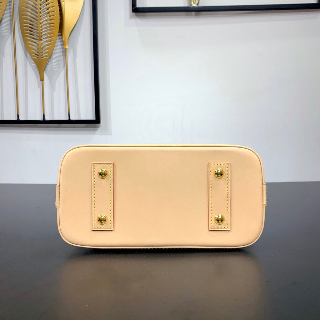 Louis Vuitton ALMA BB 23 IN BROWN MONOGRAM CANVAS AND BEIGE CALFSKIN TRIM GOLD BUCKLE