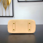 Louis Vuitton ALMA BB 23 IN BROWN MONOGRAM CANVAS AND BEIGE CALFSKIN TRIM GOLD BUCKLE