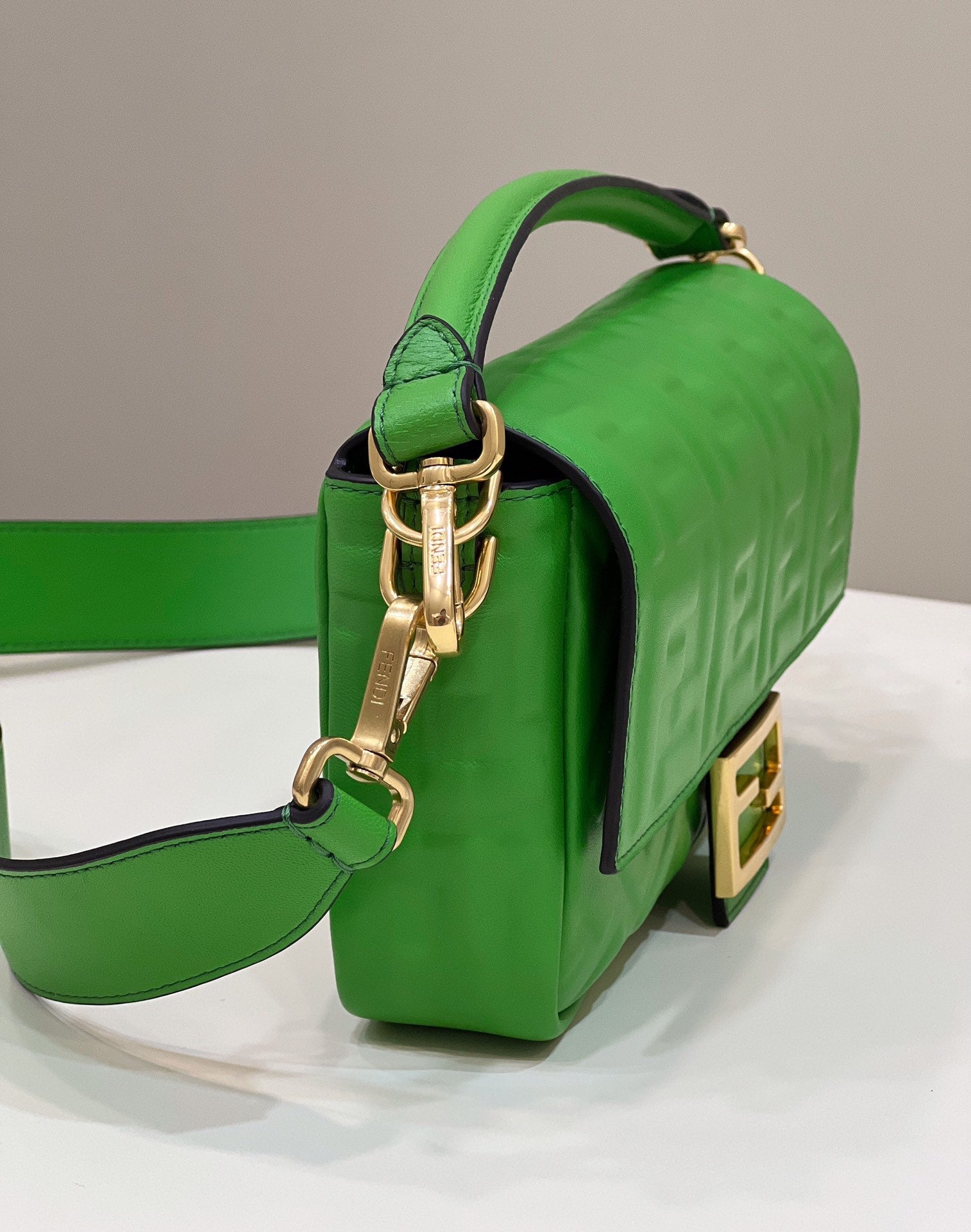 FENDI BAGUETTE WITH FF MOTIF 27 IN EMERALD GREEN SOFT LAMBSKIN GOLD HARDWARE