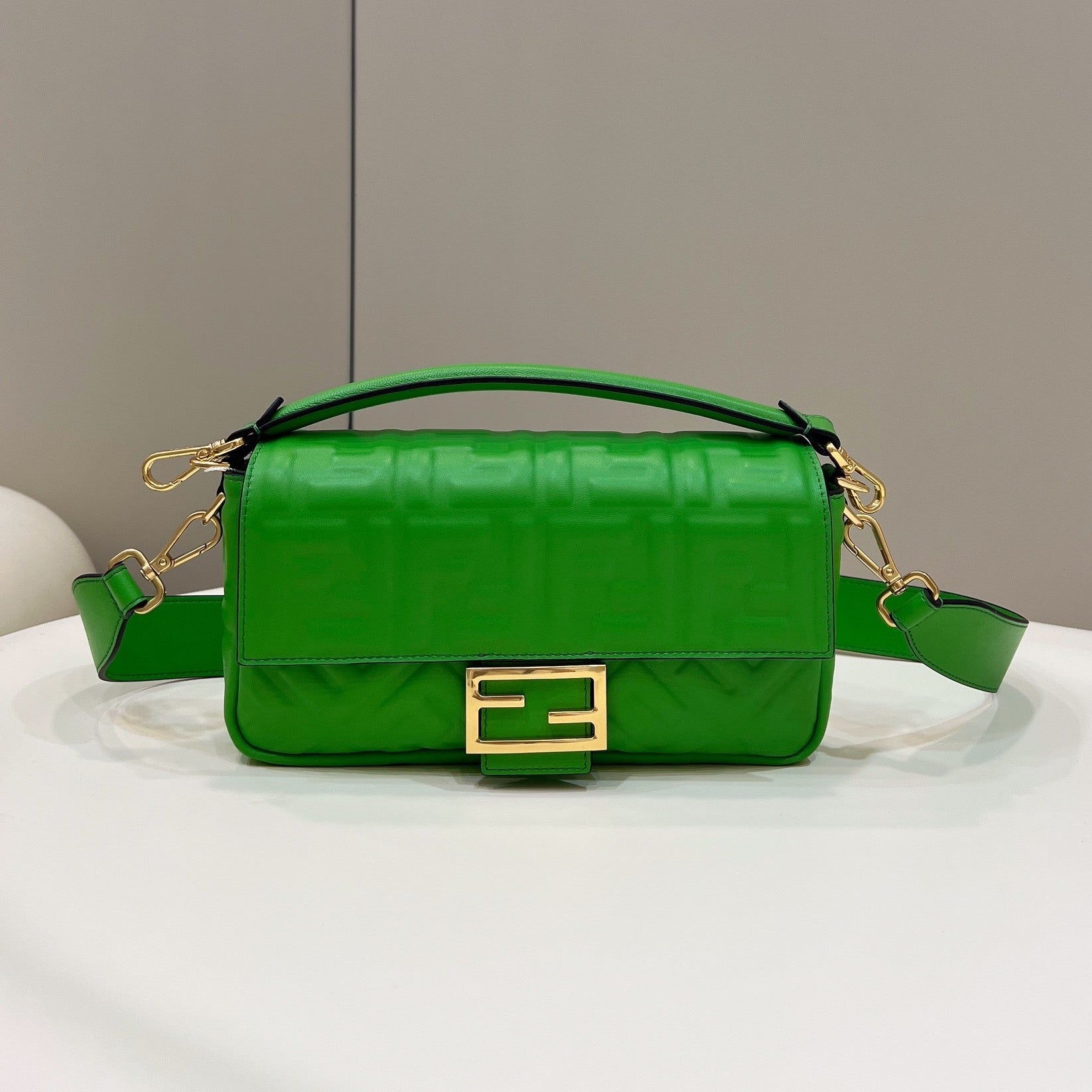 FENDI BAGUETTE WITH FF MOTIF 27 IN EMERALD GREEN SOFT LAMBSKIN GOLD HARDWARE