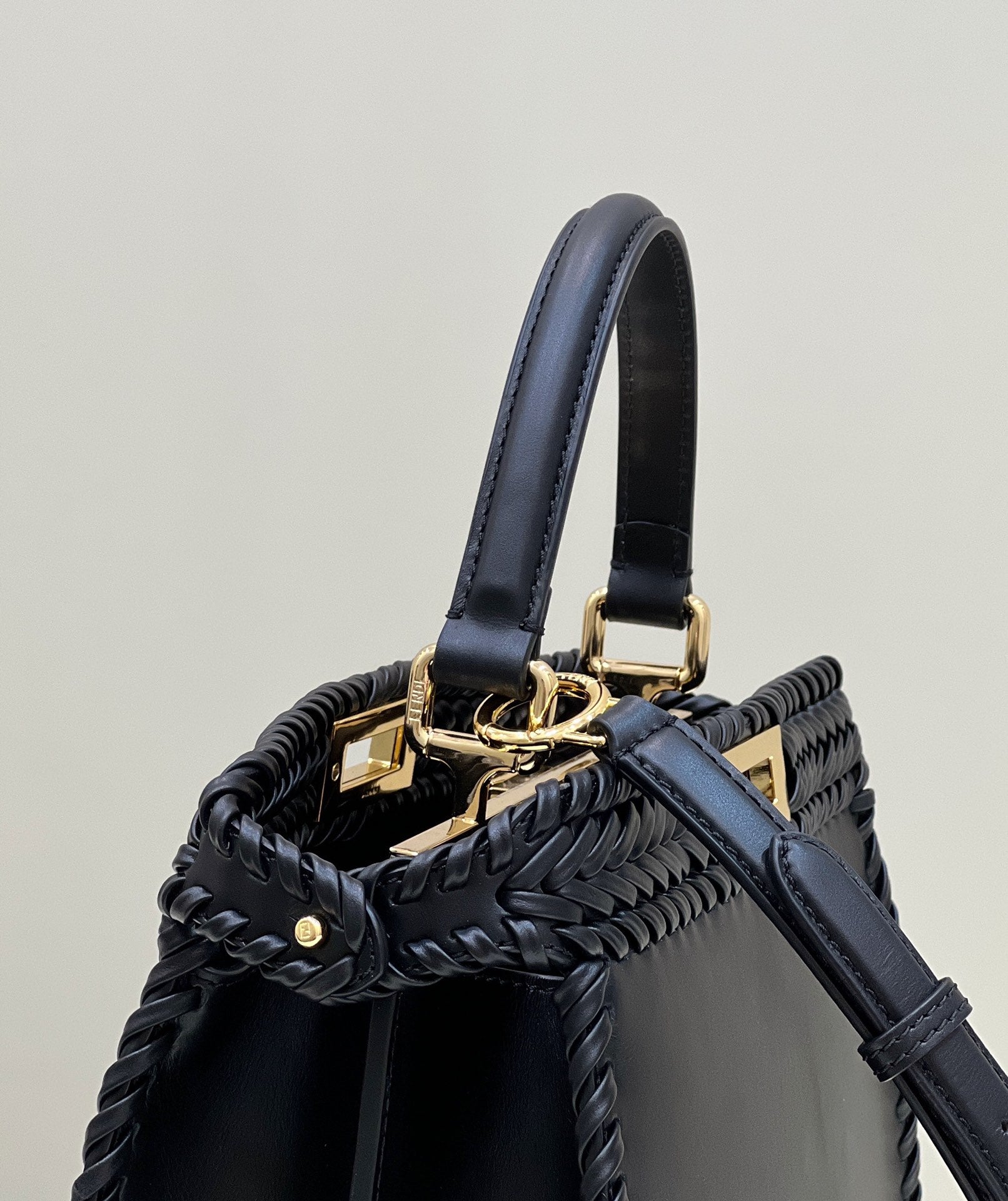 FENDI PEEKABOO ISEEU 27 IN BLACK SMOOTH CALFSKIN WITH WOVEN TRIM GOLD HARDWARE