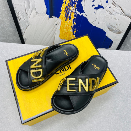 FENDI FENDI GRAPHY LOGO LETTERING SLIDES IN BLACK LAMBSKIN WITH GOLD HARDWARE
