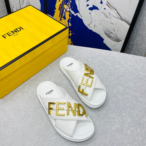 FENDI FENDI GRAPHY LOGO LETTERING SLIDES IN WHITE LAMBSKIN WITH GOLD HARDWARE