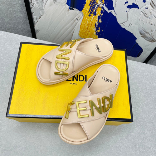 FENDI FENDI GRAPHY LOGO LETTERING SLIDES IN BEIGE LAMBSKIN WITH GOLD HARDWARE