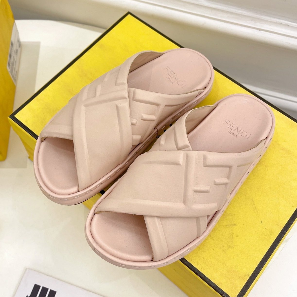 FENDI FENDI CROSSOVER SLIPPER IN PALE PINK CALFSKIN