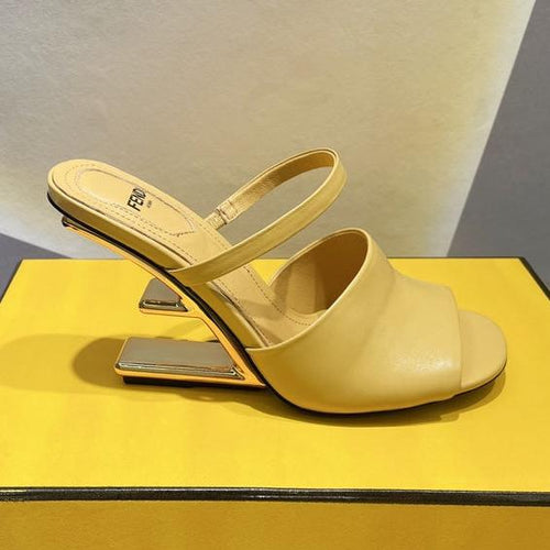 FENDI FENDI FIRST 95 MM HIGH-HEELED SANDAL IN MUSTARD YELLOW LAMBSKIN GOLD HARDWARE