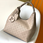 Louis Vuitton CARMEL HOBO 40 BEIGE MAHINA
