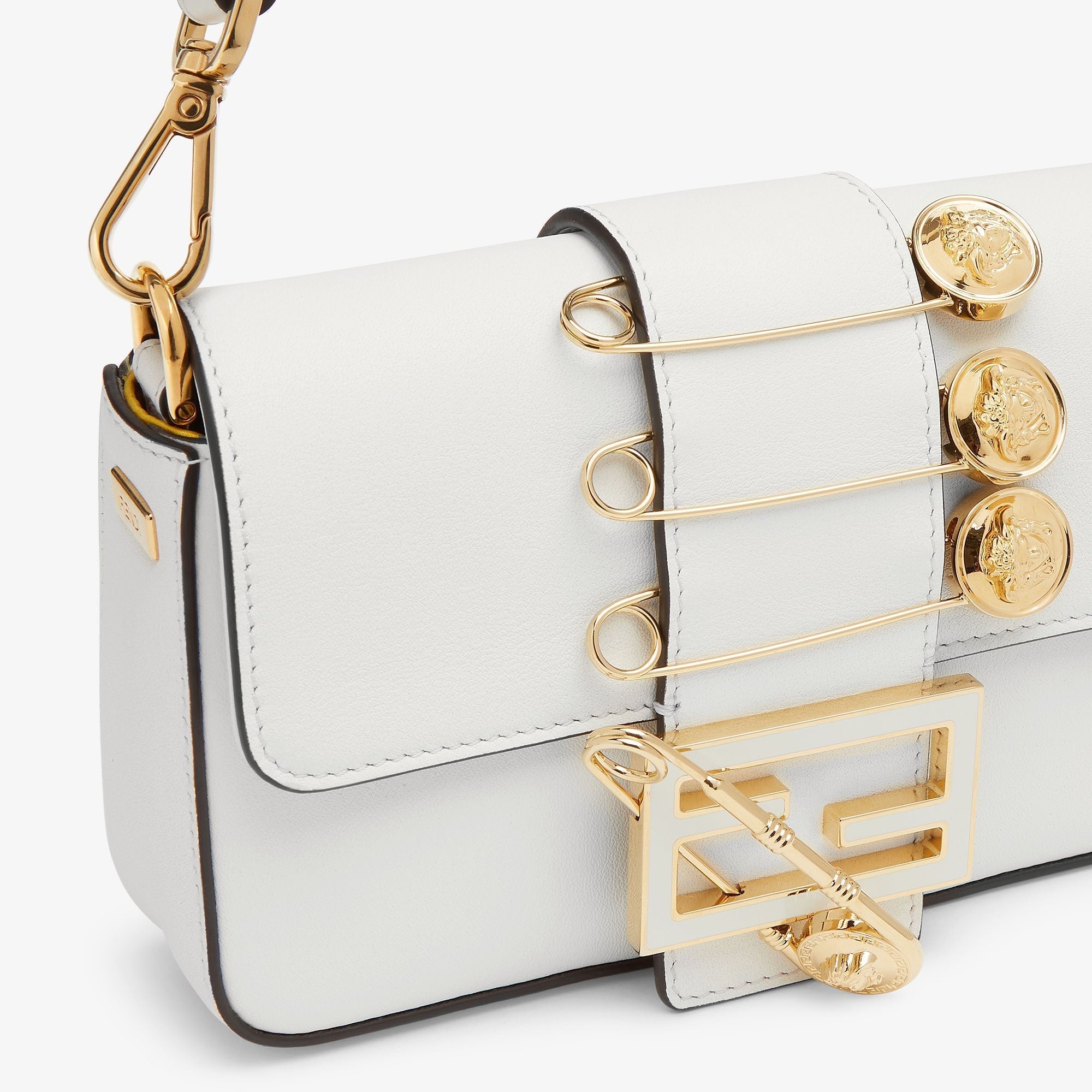 FENDI FENDI FENDACE BROOCH MINI 20 BAGUETTE BAG IN WHITE CALFSKIN