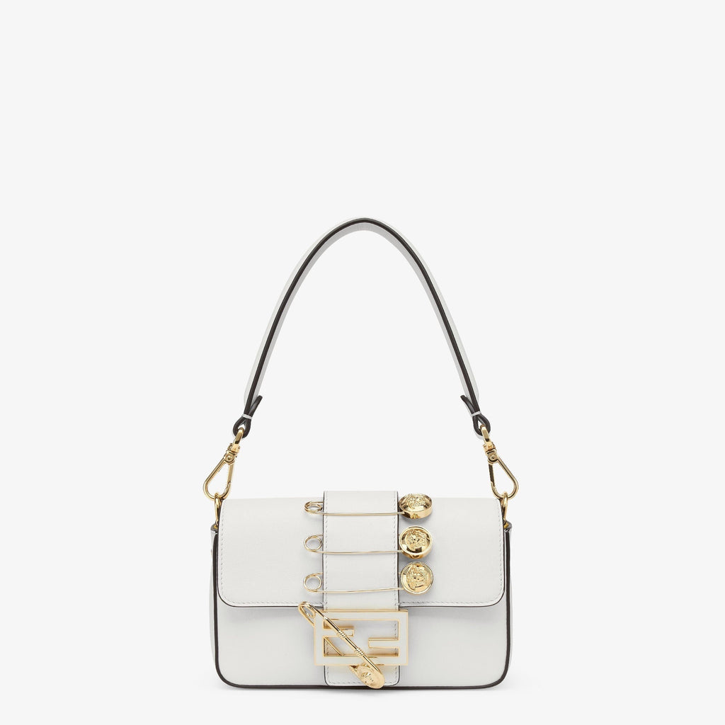 FENDI FENDI FENDACE BROOCH MINI 20 BAGUETTE BAG IN WHITE CALFSKIN