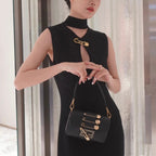FENDI FENDI FENDACE BROOCH MINI 20 BAGUETTE BAG IN BLACK CALFSKIN
