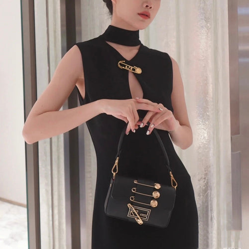 FENDI FENDI FENDACE BROOCH MINI 20 BAGUETTE BAG IN BLACK CALFSKIN