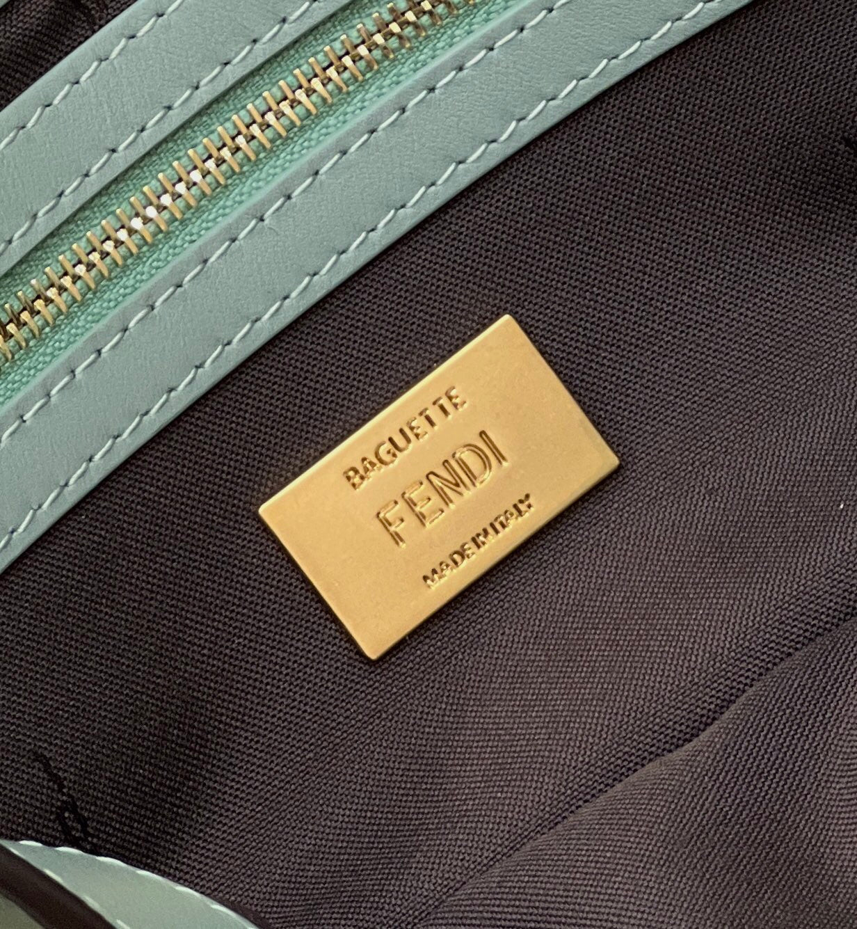 FENDI BAGUETTE WITH FF MOTIF 27 IN VIRIDIAN GREEN SOFT LAMBSKIN GOLD HARDWARE