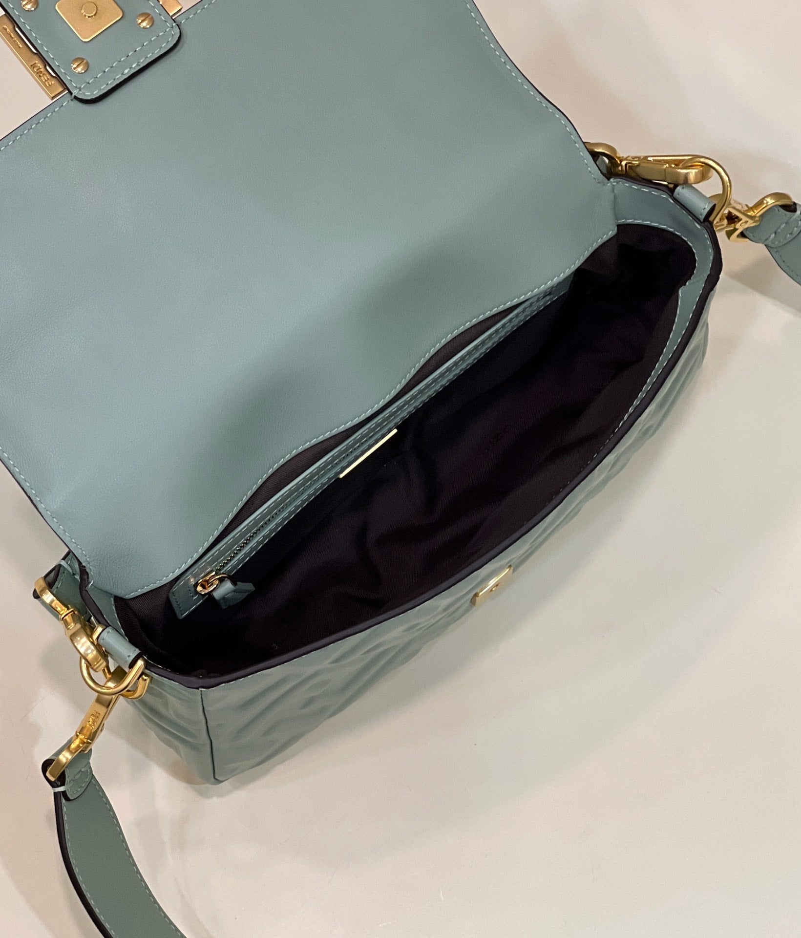 FENDI BAGUETTE WITH FF MOTIF 27 IN VIRIDIAN GREEN SOFT LAMBSKIN GOLD HARDWARE